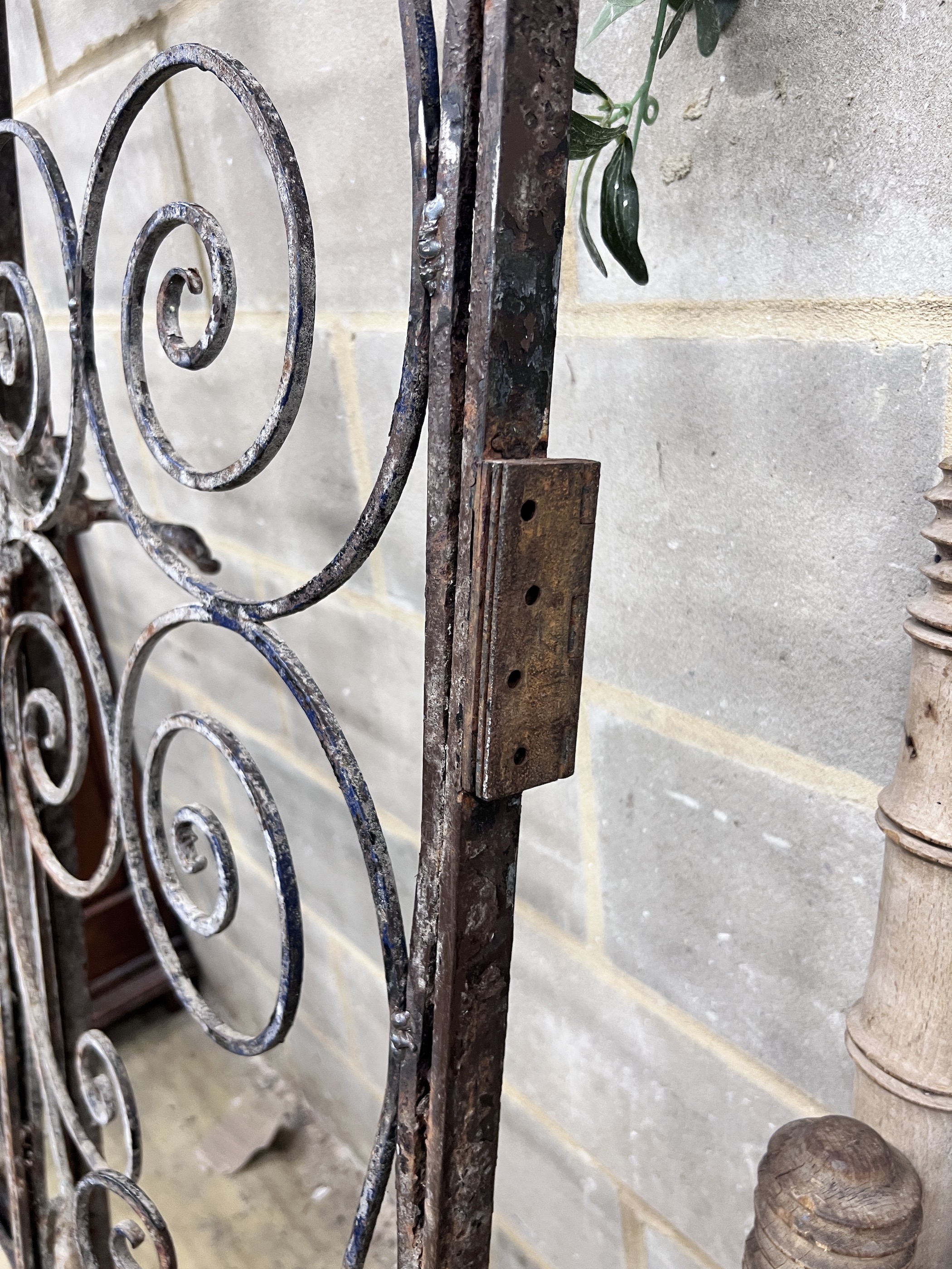 A pair of vintage French wrought iron gates, width 110cm, height 250cm
